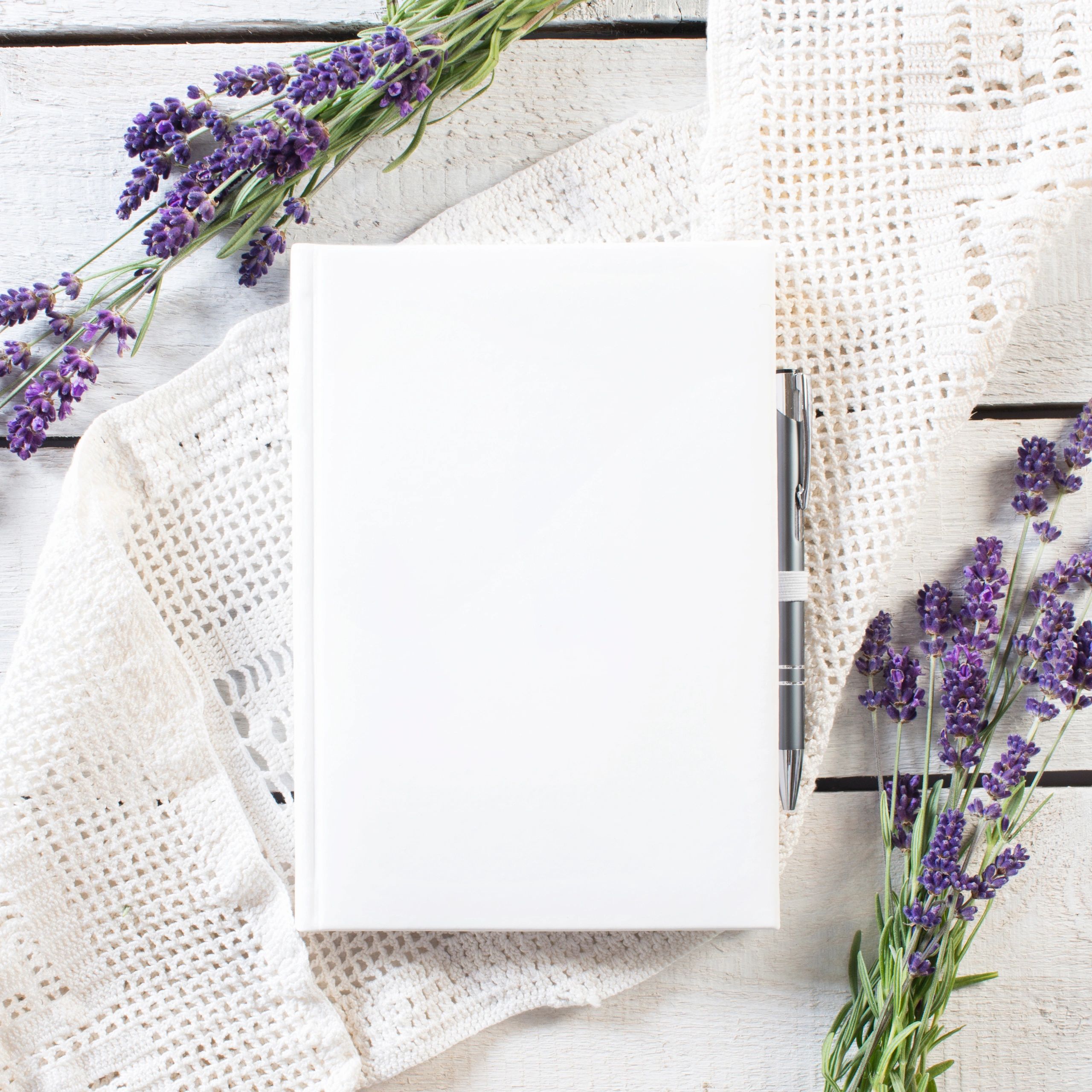 Blank book mockup with lavender flowers